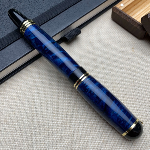 Ручка-ролер ручної роботи NV-071 виготовлена із модифікованого дерева капового клена